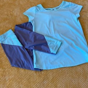 Athletic champion shirt and pant set.